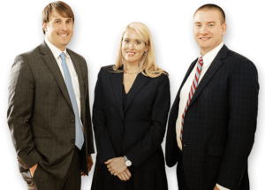 A trio of personal injury lawyers ready to help their clients.