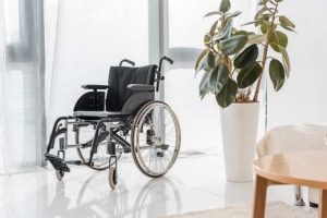 Empty nursing home wheelchair. Expert legal help for nursing home injury, abuse, and neglect victims.