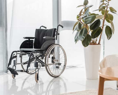Empty nursing home wheelchair. Expert legal help for nursing home injury, abuse, and neglect victims.