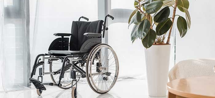 Empty nursing home wheelchair. Expert legal help for nursing home injury, abuse, and neglect victims.