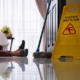 A "caution: wet floor" safety sign. Legal help for slip-and-fall and trip-and-fall accident victims in Jackson, MS.